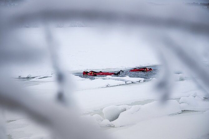 3-Hour Shared Arctic Morning Floating Experience in Norway - Getting into the suit at the Arctic Survival Camp