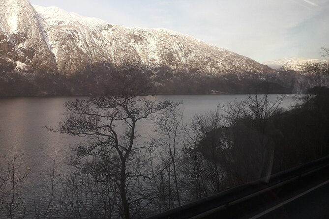 Bride's Veil and Steinsdalsfossen waterfalls with sceneries of Hardanger Fjord - Hardangerfjord, fruit farms, and mountain roads