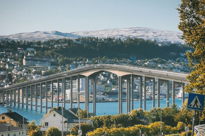 Discover the most Photogenic Spots of Tromsø with a Local - Tromsø Harbour connects old buildings with Arctic views