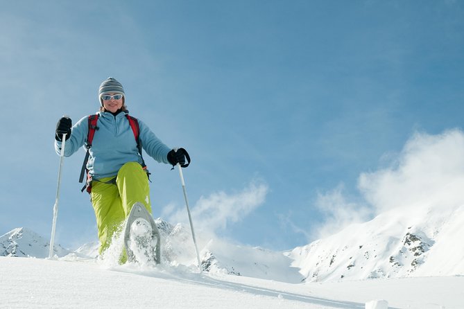 Eco friendly snowshoeing in Scenic Landscape - Tromso Cathedral is a quick architectural stop
