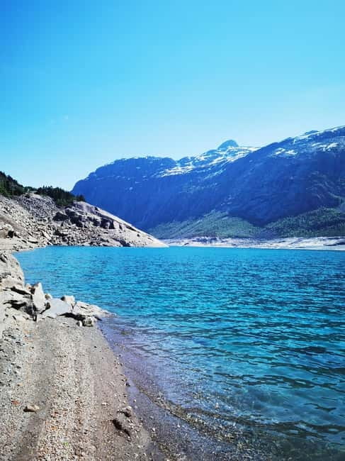Flexible tour to Hardangerfjord vøringsfossen cruise include - Crossing Hardanger Bridge Toward Vøringsfossen