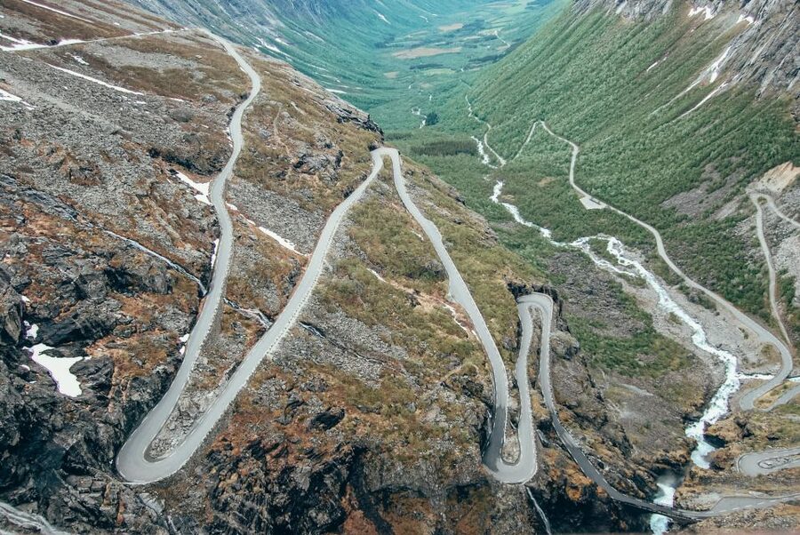 From Ålesund: Trollstigen Sightseeing Village & Fjord Tour - Troll Wall and the ride through Åndalsnes