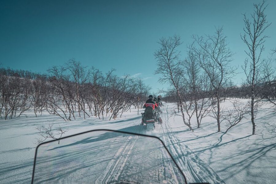From Alta: Daytime Snowmobile Adventure - Arctic stories, local food, and the stop that breaks up the ride