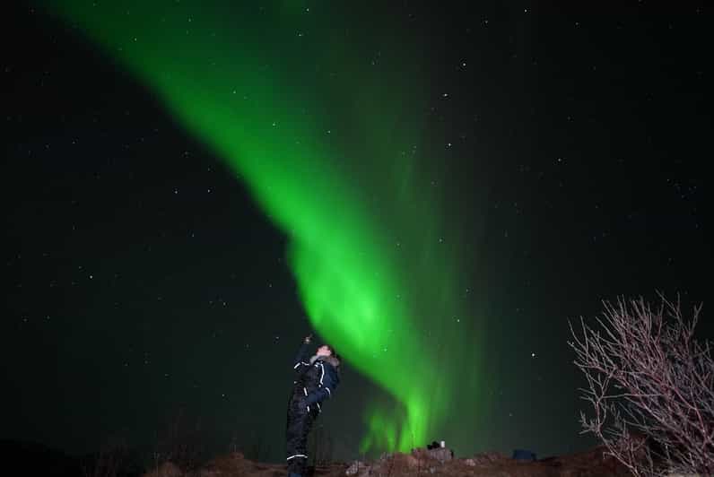 From Tromsø: Northern Lights Tour with Hot Drinks and Photos - Warm suits, spikes, and a real winter wait