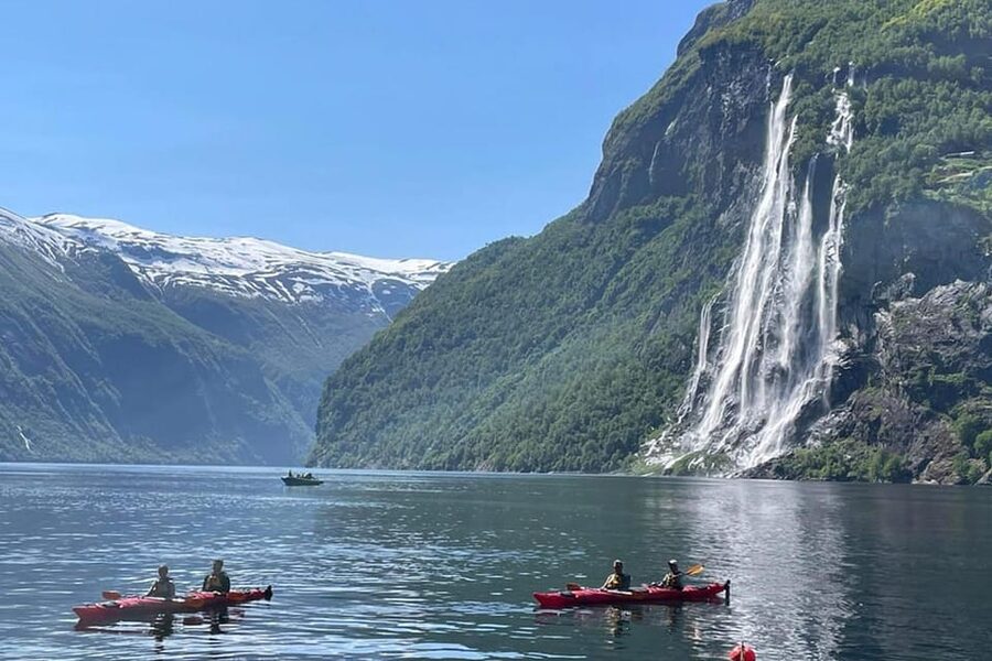 Geiranger Fjord Boat Tour with Waterfall Tasting - Mountain farms, cliffs, and the quieter side of the fjord