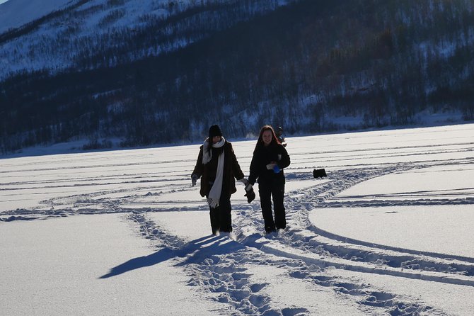 Ice Fishing On The Fjord - Cooking cod at the basecamp