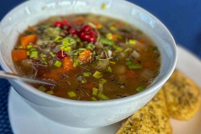 Luxury Northern Lights Yacht Cruise with Hot Tub from Tromsø - Reindeer soup, bread, and warm drinks