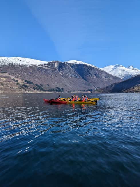 Olden: Guided beginner friendly fjord kayaking.Local company - Why the rescue boat and drysuit matter