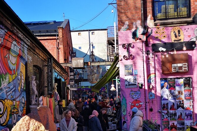 Oslo: Norwegian Food Tour & Hidden Gems City Walk - Grünerløkka by river, bridge, and wooden house