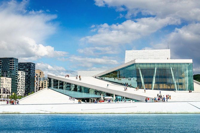 Oslo: Private VIP City Tour by Luxury Minivan with Driver & Guide - Walking through central Oslo with a guide