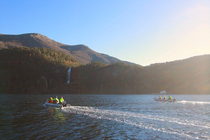 Private Fjordcruise by Luxury Pontoon Boat - Bergen Fjords - Waterfalls, reflections, and a close shoreline view