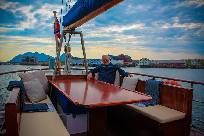 Small Group Luxury Cruise to Trollfjord on a 33m Classic Yacht - Crossing Vestfjord with Lofoten in view