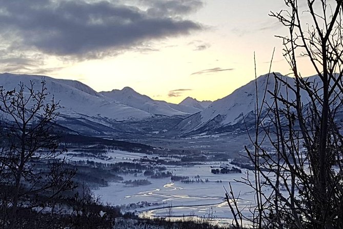 Snowshoeing With A View - A warm meal beside the fire