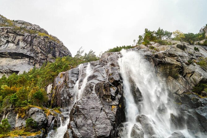 Stavanger: Waterfalls, Caves and Rock Tour By Sea - Waterfalls, mountain water, and a close approach