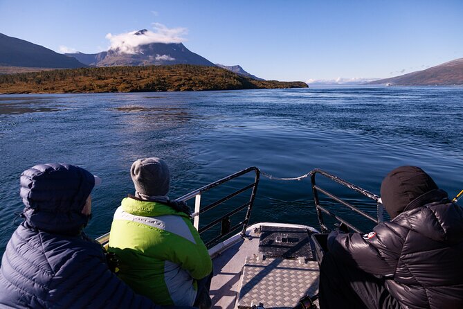 Tromsø: Arctic Fjord Cruise & Fishing Experience - Staying Warm on a Wooden Boat
