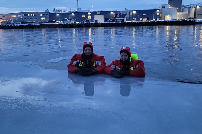 Tromso Arctic Fjord Floating - Getting ready in the warm cabin
