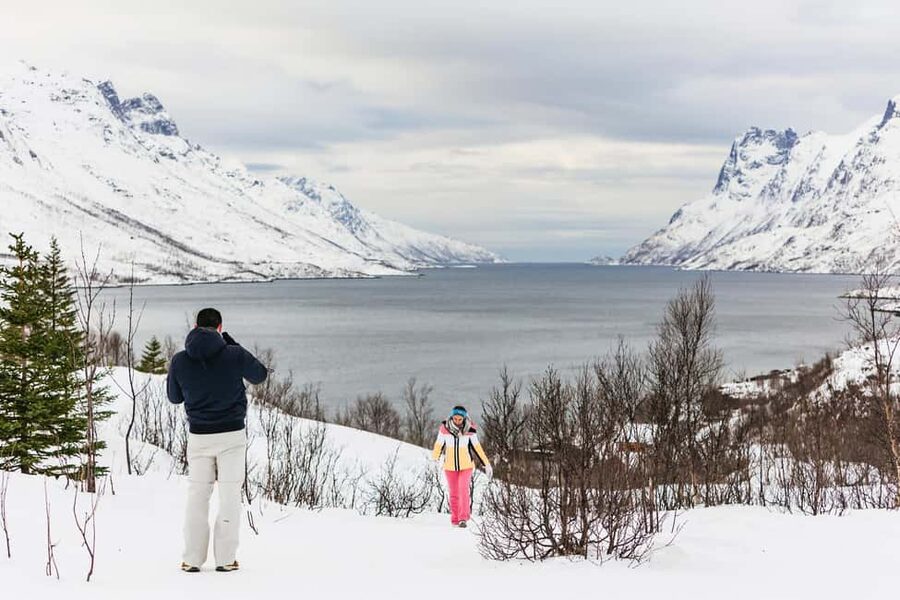 Tromsø: Arctic Landscape and Fjord Tour with Snacks - Leaving Tromsø by warm minivan