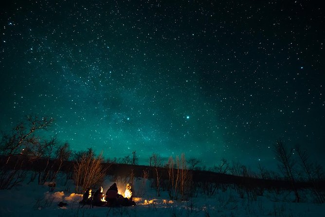 Tromso Aurora Hunt with Bonfire, Soup, Winter Gear & Transfers - The value of a $226.72 aurora hunt