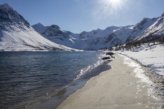 Tromso fjords road trip with fire in grill cabin by the beach. - Why this Tromsø road trip is worth your time