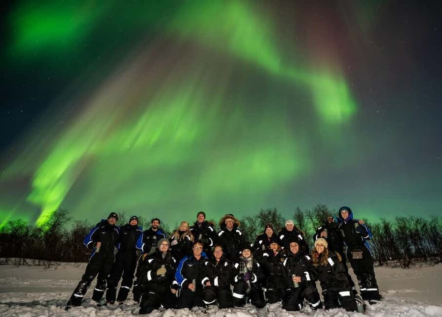 Tromsø: Northern Lights Chase + Free Professional Photos - Campfire food, hot chocolate, and Arctic waiting
