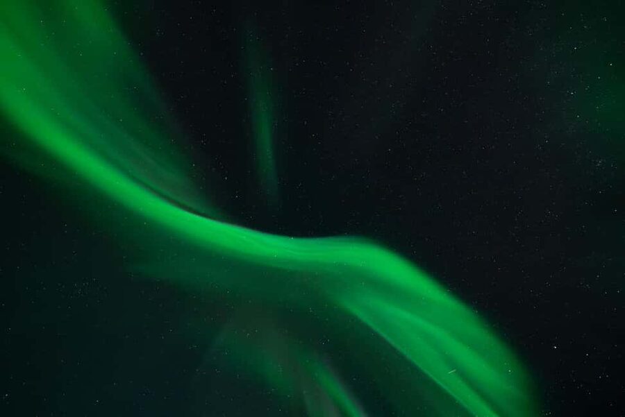 Tromsø: Northern Lights Focus Tour, German/English, minibus, meal - Campfire soup in the Arctic dark
