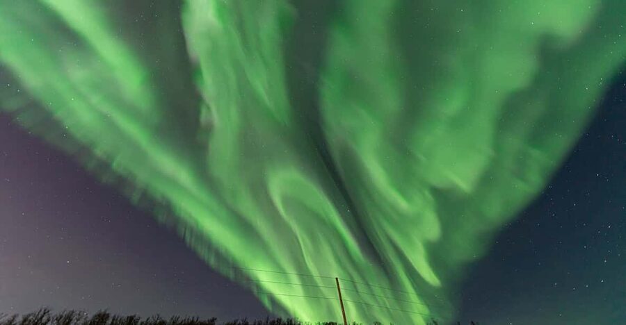 Tromsø: Northern Lights Tour w/Photo, Suits and Local Guide - Warm suits, hot drinks, and midnight food
