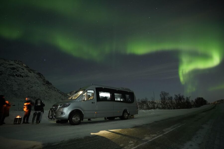 Tromsø: Northern Lights Tour with Free Professional Portrait - Chasing clear skies from Kirkegata 2