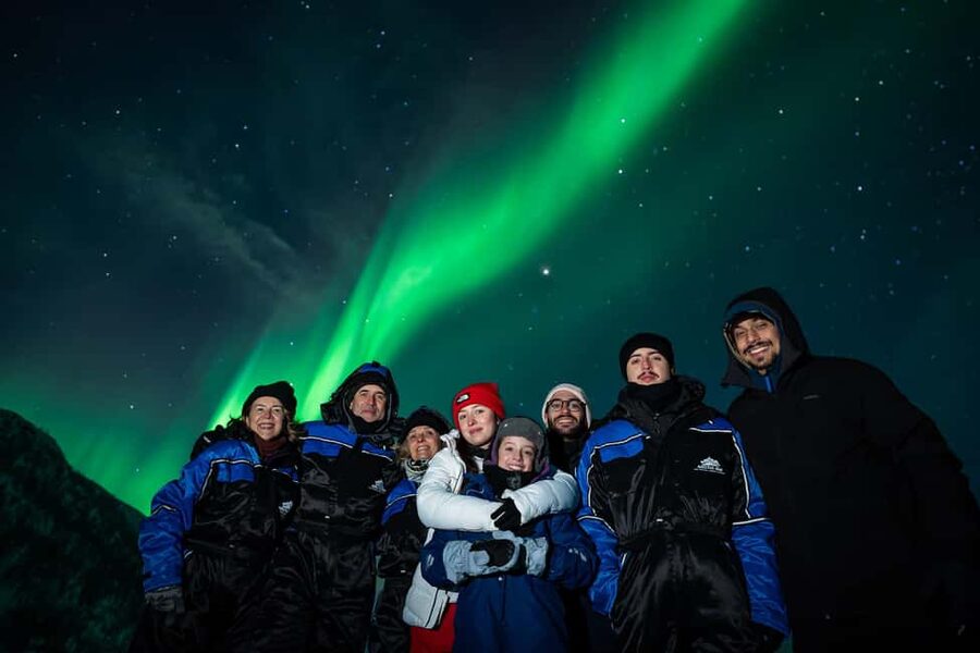 Tromsø: Northern Lights Tour with Guaranteed Sightings - Hotel pickup, a new bus, and a long Arctic night