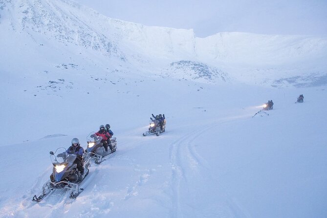 Tromsø Snowmobiling, Ice Domes Snow Park, and Reindeer Visit - Getting suited up for Arctic riding